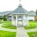 a small gazebo in a yard