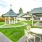 a backyard with a table and chairs