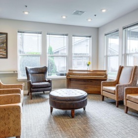 Your new favorite social area a room with chairs and a table